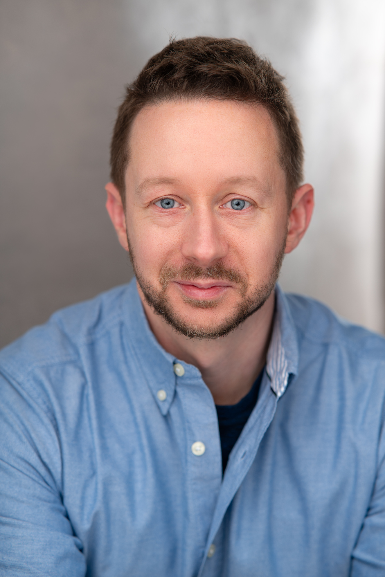A headshot of JJ